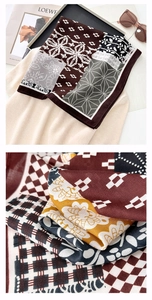 Détail d'un foulard en soie au motif géométrique rétro avec lunettes et accessoires