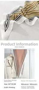Detailed texture of printed diamond silk scarf and display on a beige blazer