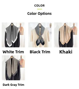 Detail view of silk scarf collection featuring four elegant geometric V-pattern color options