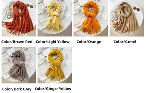 Detailed grid of soft cashmere-feel scarves in warm brown, yellow, and grey with tassels