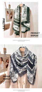Detailed close-up of retro ethnic print mercerized wool scarf with fine fringe edges