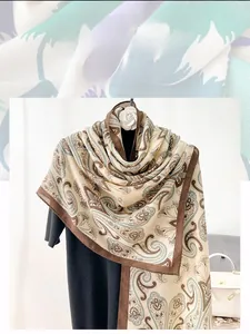 Close-up of elegant cotton linen scarf featuring vintage brown paisley prints and borders