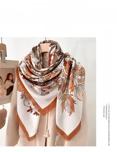 Detail of mercerized wool scarf featuring vintage floral prints and delicate loose whiskers