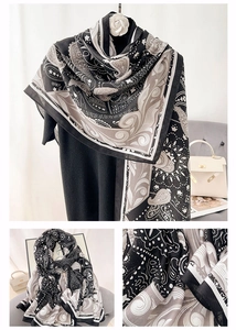 Close-up of black and white paisley pattern on lightweight cotton linen shawl wrap