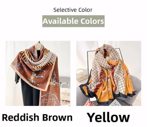 Detail showing two floral cotton linen scarves in reddish brown and yellow patterns