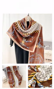 Close-up of equestrian chain print on soft cotton linen scarf with plaid patterns