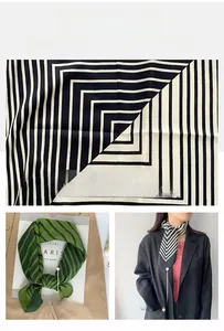 Detail of lightweight herringbone silk scarf with geometric stripes and refined edges