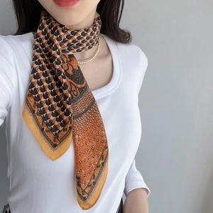 Elegant herringbone square scarf with orange polka dots and black houndstooth pattern