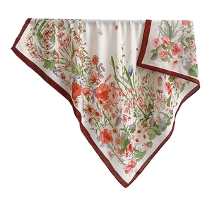 Elegant square floral silk scarf with vibrant blossoms and deep red piping on cream base