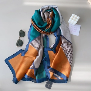 Elegant geometric color-block silk scarf with leopard print and houndstooth patterns