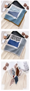 Close-up of square floral scarf with rose patterns and premium silk-like texture detail