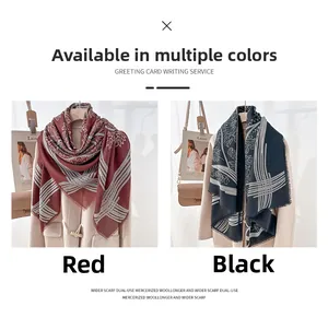 Detailed comparison of red and black ethnic print wool shawls on beige coats