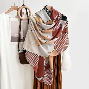 Elegant geometric patterned shawl scarf with houndstooth and checkerboard print in beige