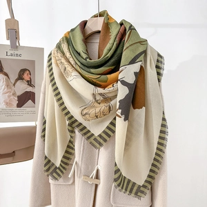 Floral print square scarf with mustard yellow and dark green color blocks and fringe edge