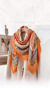 Close-up of a vintage ethnic square scarf with 130cm fringe trim and heraldic print