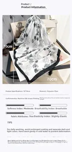 Detail of floral print silk scarf made of polyester fiber with ginkgo leaf pattern