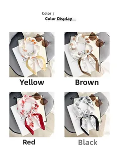 Four floral print square scarves displayed in yellow, brown, red, and black colors