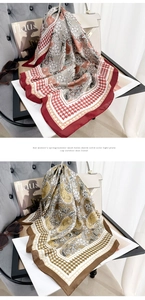 Detail of square silk scarves with vintage floral prints and classic houndstooth patterns