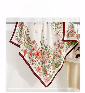 Detail of elegant 90cm square floral silk scarf with vintage orange and pink pattern