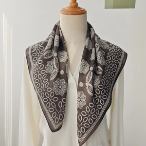 Deep brown square silk scarf with lace floral print styled on a mannequin with shirt
