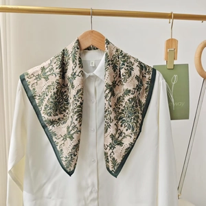 Classic floral silk scarf with vintage damascus pattern on a white shirt