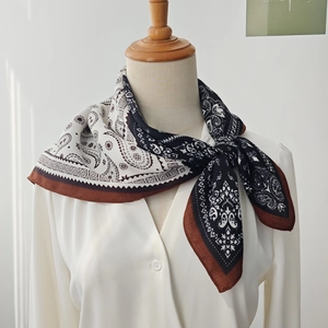 Vintage paisley print cotton linen neck scarf styled on a white shirt neckline