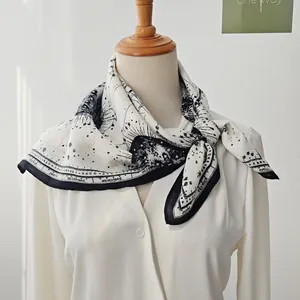 Astrological print scarf in black and white featuring constellation and moon motifs