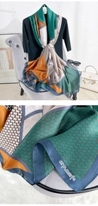 Macro detail of geometric color block silk scarf with classic houndstooth pattern texture