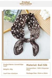 Detail of vintage dark coffee paisley square scarf with white floral patterns and wavy edges