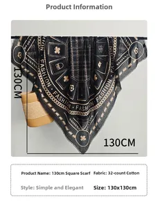 Détail d'un foulard carré de qualité avec imprimés chaîne dorée et bords effilochés