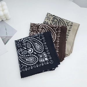 Three elegant paisley print square scarves in black brown and khaki with lace edges