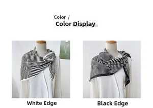 Close-up of black and white striped satin scarf showing refined edge stitching detail