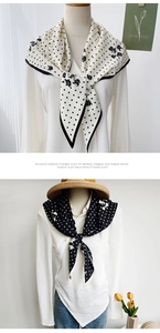 Detail of elegant polka dot scarves with soft velvet texture on a mannequin