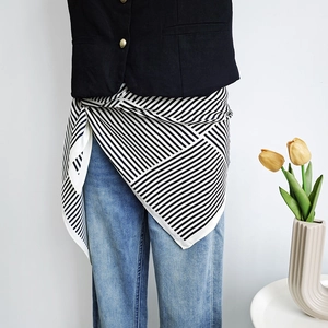 Minimalist black and white striped satin neckerchief styled as a chic waist accessory