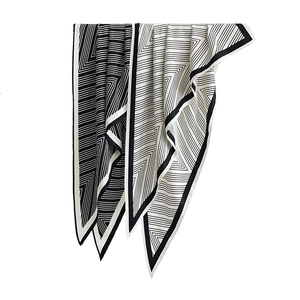 Fashionable black and white skinny scarf with geometric linear prints for professional women