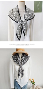 Detailed view of paisley and floral triangle scarves with premium velvet texture