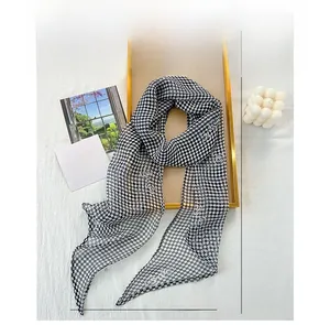 Detail of 155x28cm chiffon scarf with checkerboard pattern and white rose print