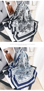 Detailed view of French Toile de Jouy floral silk scarves in black and blue patterns