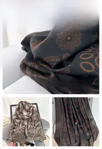 Macro detail of mandala pattern on soft ethnic shawl with elegant drape and fine texture
