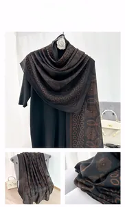 Detail of a vintage mandala print scarf with lightweight fabric and elegant drape