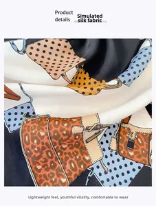 Detail of silk-like fabric showing elegant leopard print and polka dot pattern with soft drape
