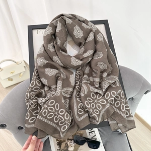 Ethnic style long scarf with white floral print on coffee brown lightweight fabric