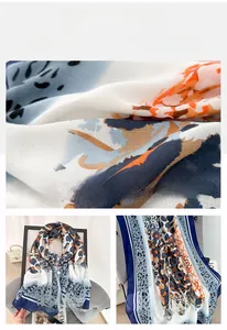 Macro shot of stylish lightweight scarf with vibrant leopard and floral prints