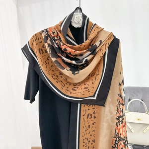 Fashionable leopard print lightweight scarf shawl with orange accents for women