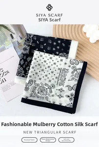 Detailed view of paisley silk cotton bandana scarf styled with French aesthetic props