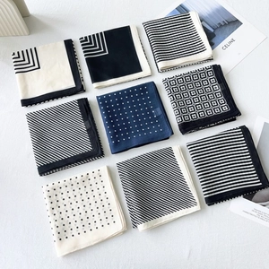 Nine-piece set of silk-cotton blend men's pocket squares with paisley and geometric patterns