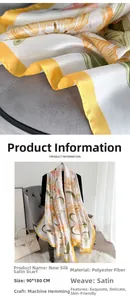 Detail of silk satin scarf featuring yellow tulips and high-quality machine hemmed edges