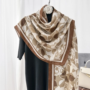Elegant camellia print cotton linen shawl scarf in earthy tones for summer sun protection