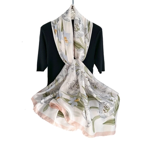 Elegant satin silk scarf with lilac camellia floral print and soft pink border