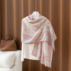 Detail of vintage geometric floral print on lightweight dusty pink and beige shawl